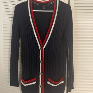 Long sweater with buttons and pockets